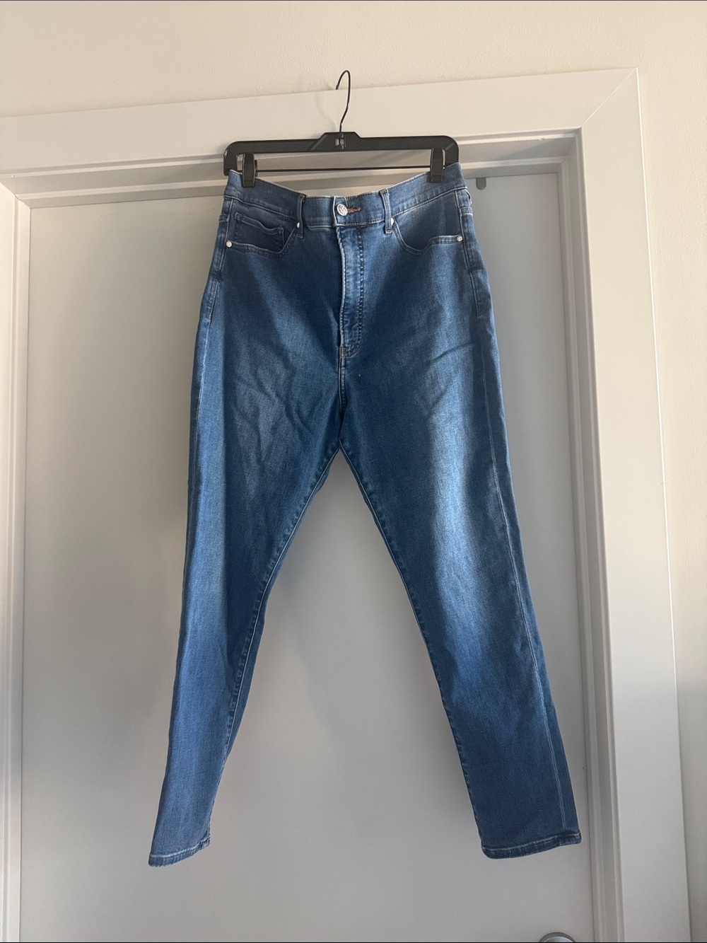Express Skinny Super High-Rise Jeans  with rhinestone button detail